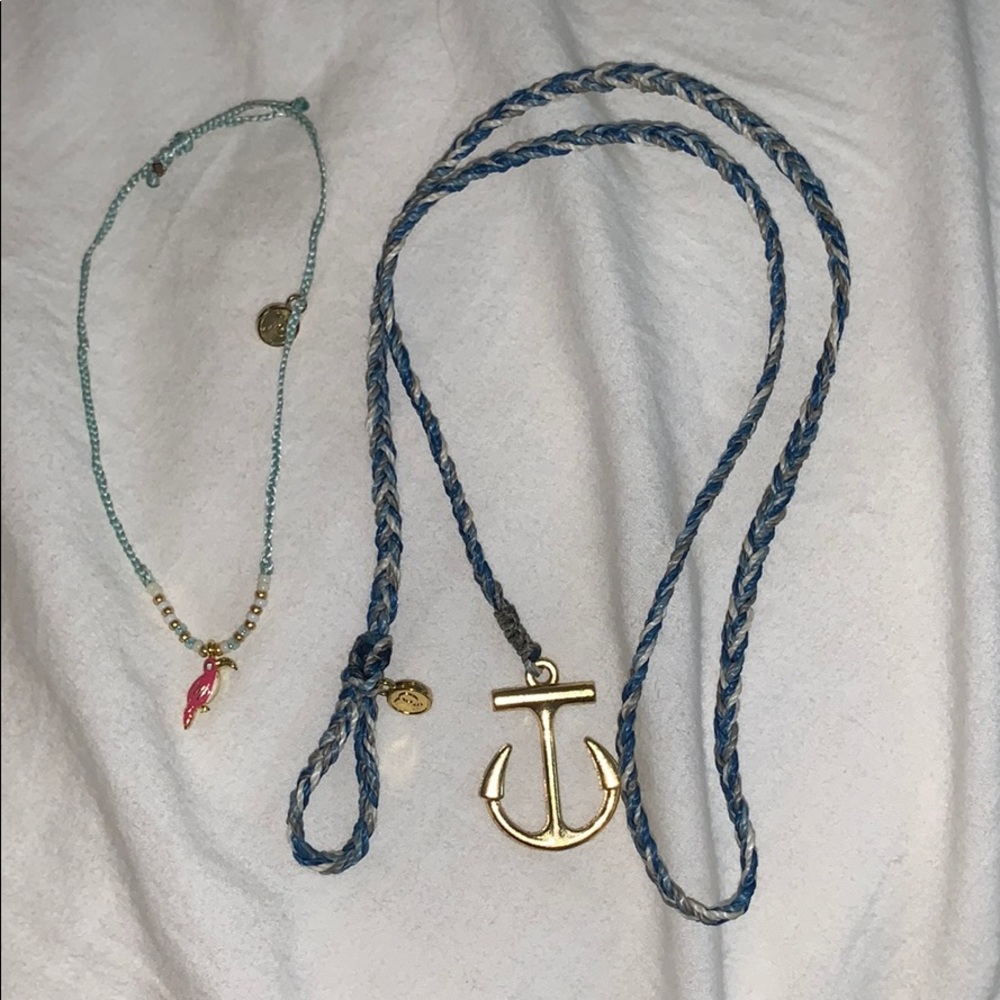 Two Pura vida bracelets